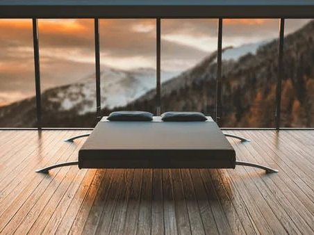 Modern bed on luxury vinyl flooring